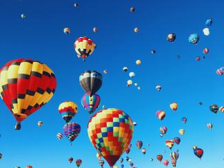 hot air balloon pfestival by Kyle Hinkson courtesy of Unsplash.